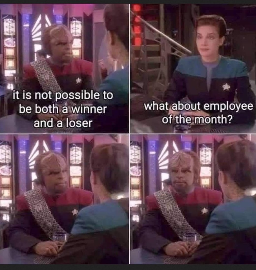 This meme features a humorous exchange between two characters from the TV show "Star Trek: Deep Space Nine". The image shows a Klingon warrior, Gowk, and a Bajoran, Kira, engaged in a conversation. The text on the image reads: "It is not possible to be both a winner and a loser. It is not possible to be both a winner and a loser."